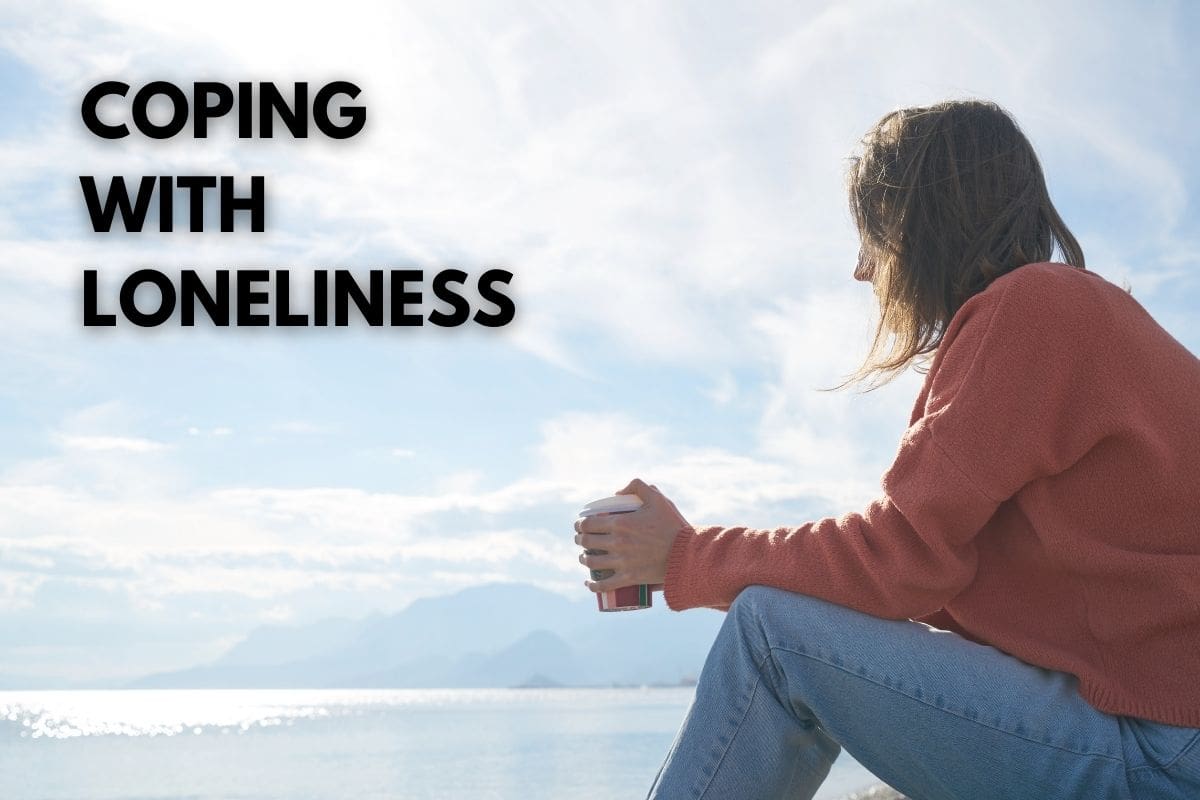 an image of a female sitting down learning to cope with loneliness without alcohol